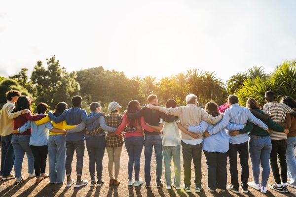 Group,Of,Multigenerational,People,Hugging,Each,Others,-,Support,,Multiracial